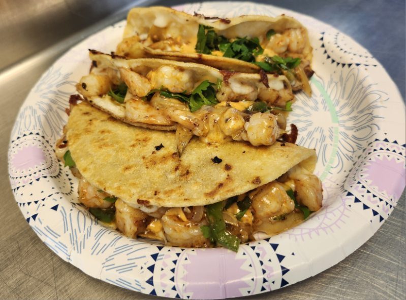 Chipotle-sautéed protein served with warm tortillas.