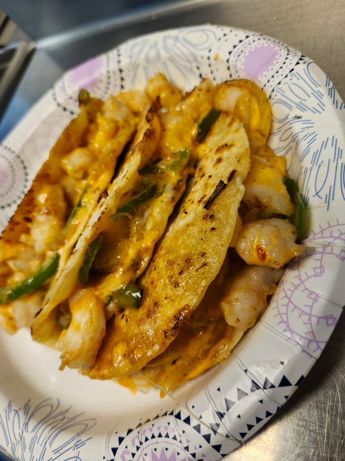 Shrimp quesadillas fresh off the grill.